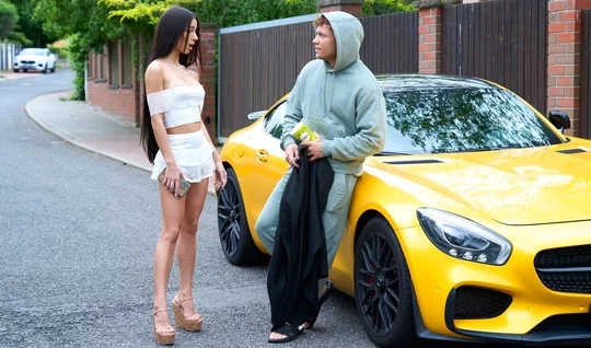 Long-haired brunette gives a great blowjob to a rich boyfriend