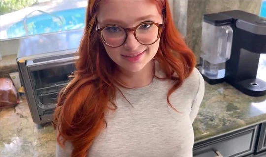 A red-haired bitch with glasses sucks cool in close-up porn